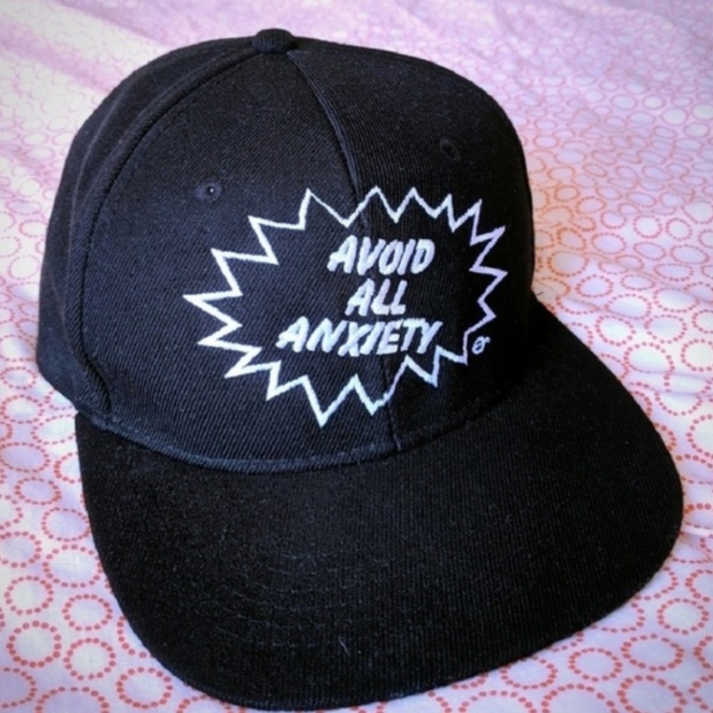 Black cap by Roundel London Underground